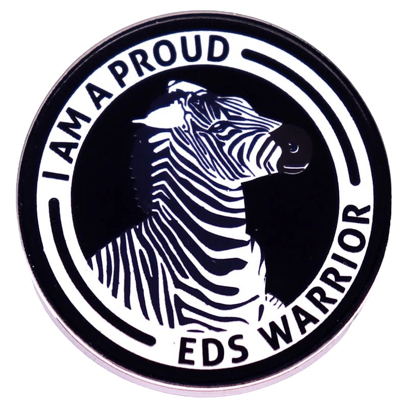 Pin — “I am Proud. EDS Warrior”.