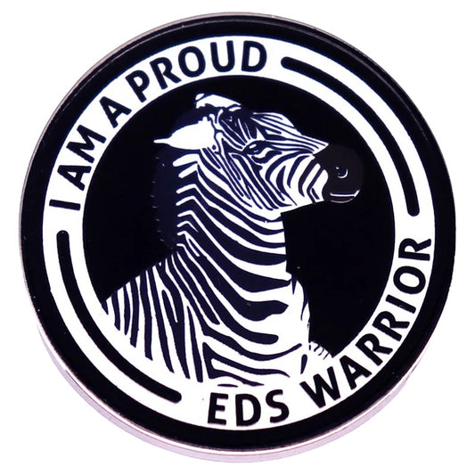 Pin  — “I am Proud. EDS Warrior”.